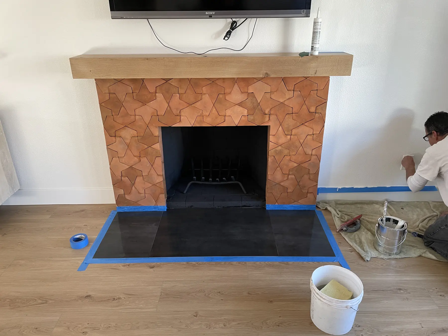 Grout-free clay tile fireplace, San Diego — after photo 1