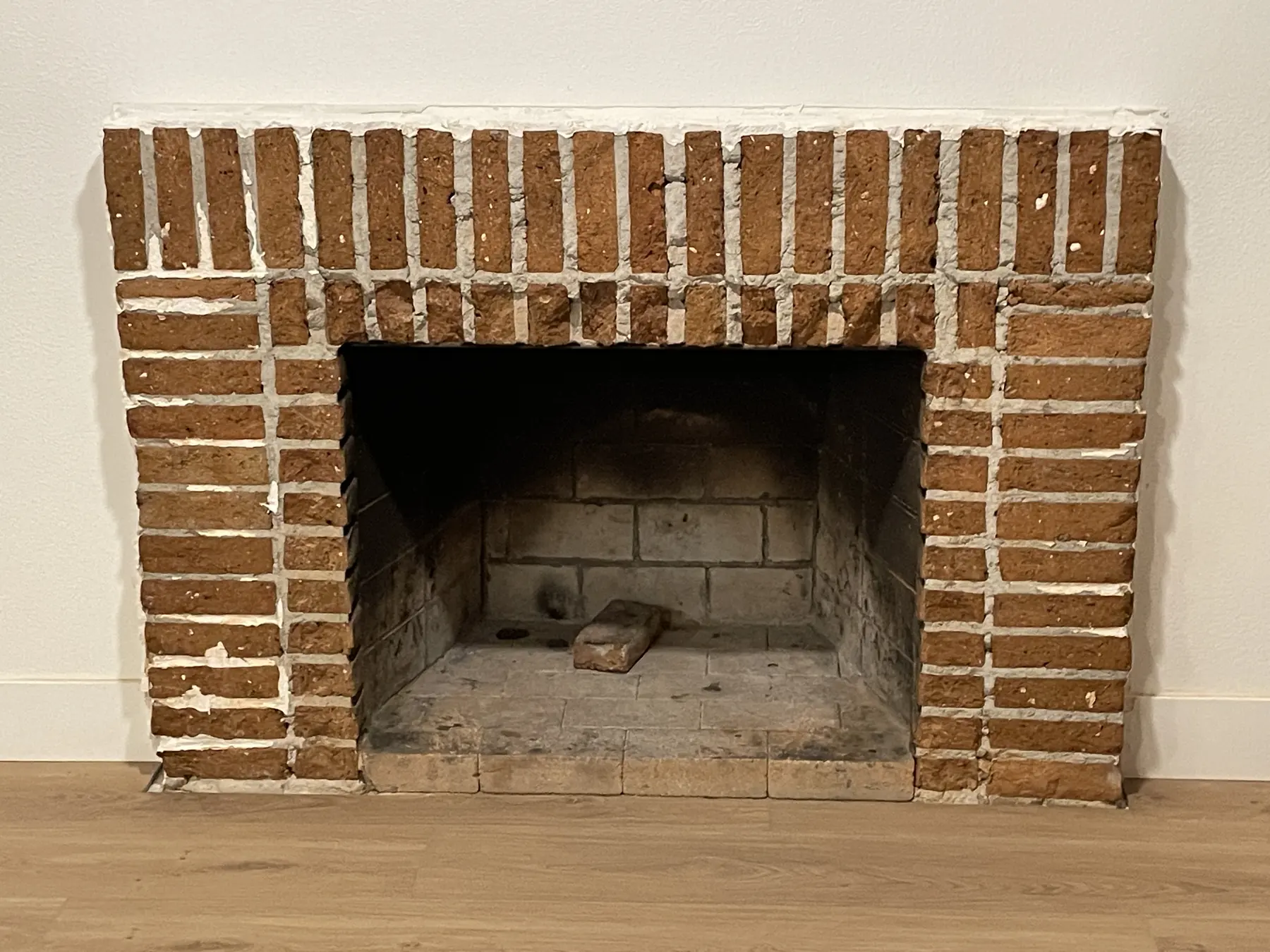 Grout-free clay tile fireplace, San Diego — before photo 2