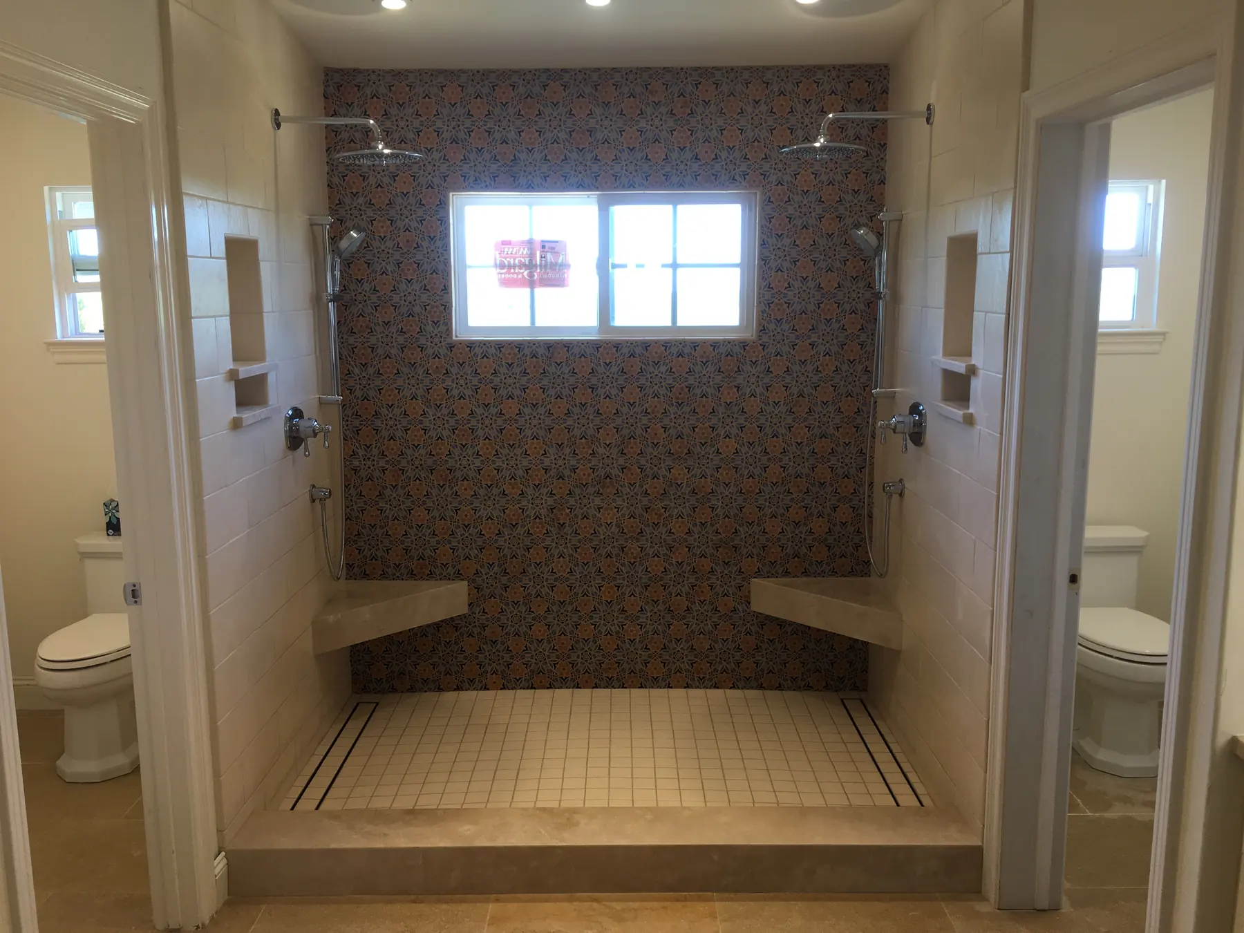 Insurance rebuild: double shower & arched vanity in Rancho Peñasquitos